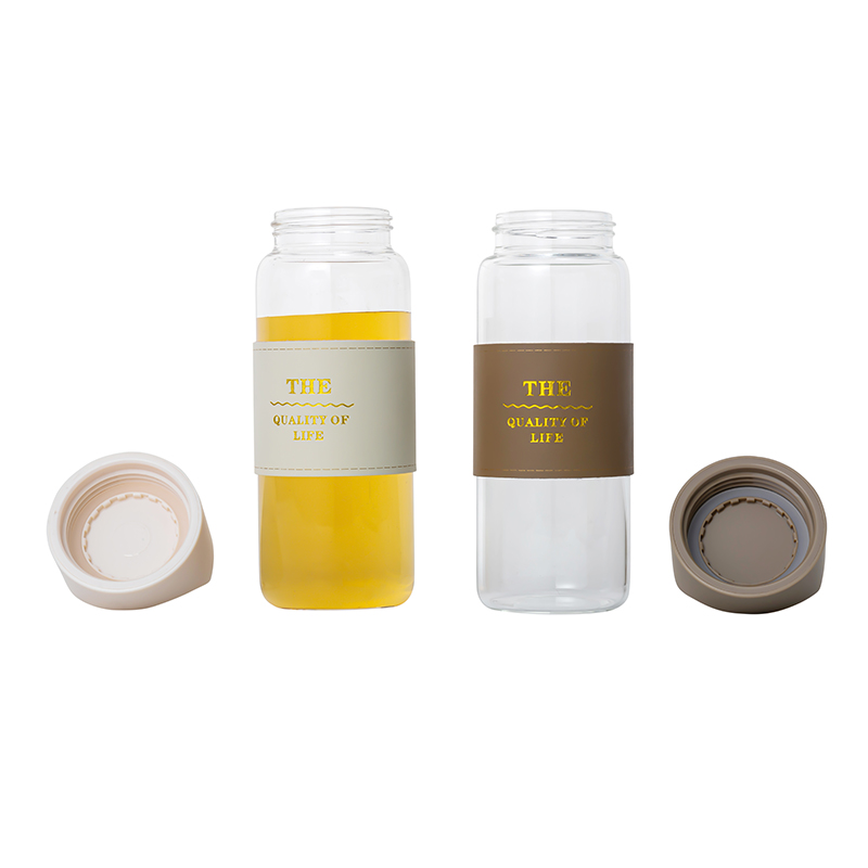 Botellas de vidrio de vidrio de venta caliente 400 ml con soporte de silicona aislada