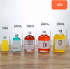 Botellas de vidrio para bebidas al por mayor con etiquetas privadas