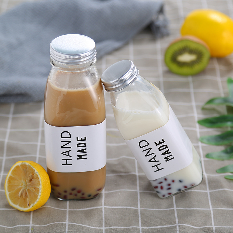 Botellas de bebida de cristal vacías de la venta caliente 350ml para el jugo de la leche del café