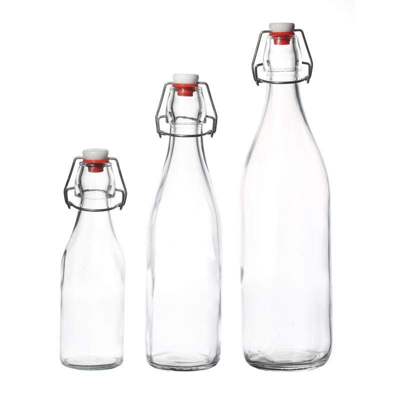 Botellas de vidrio para bebidas al por mayor de 250 ml Botellas de leche de agua con tapas abatibles